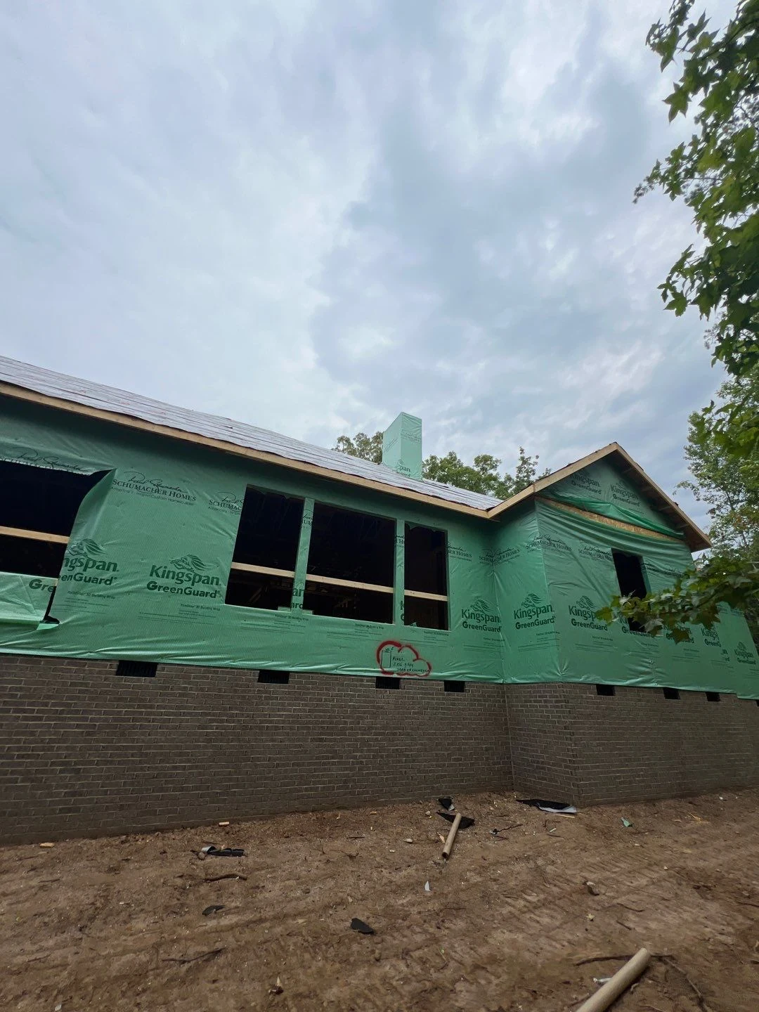 Single-story home sheathed and dried in