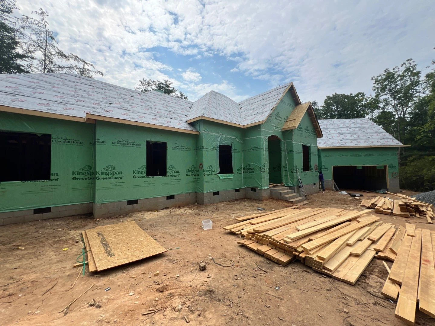 Single-story home sheathed and dried in
