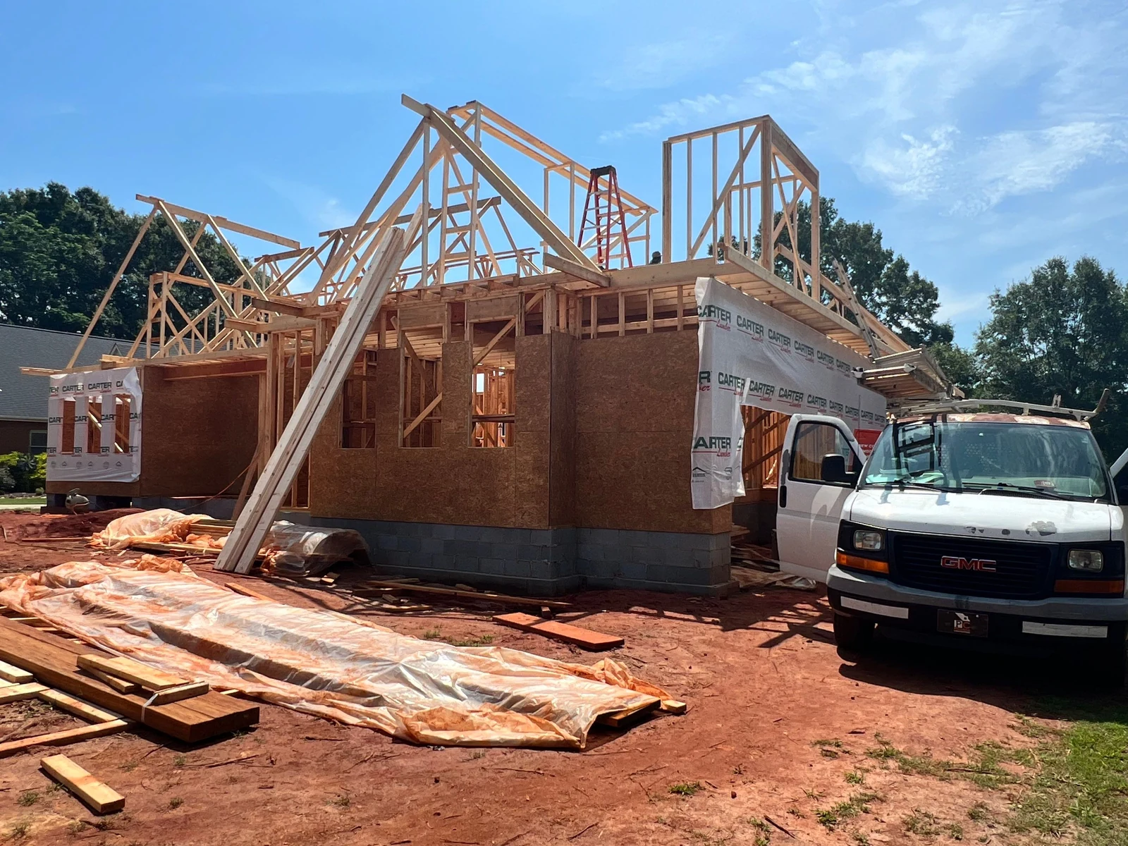 Custom home frame with roof trusses set