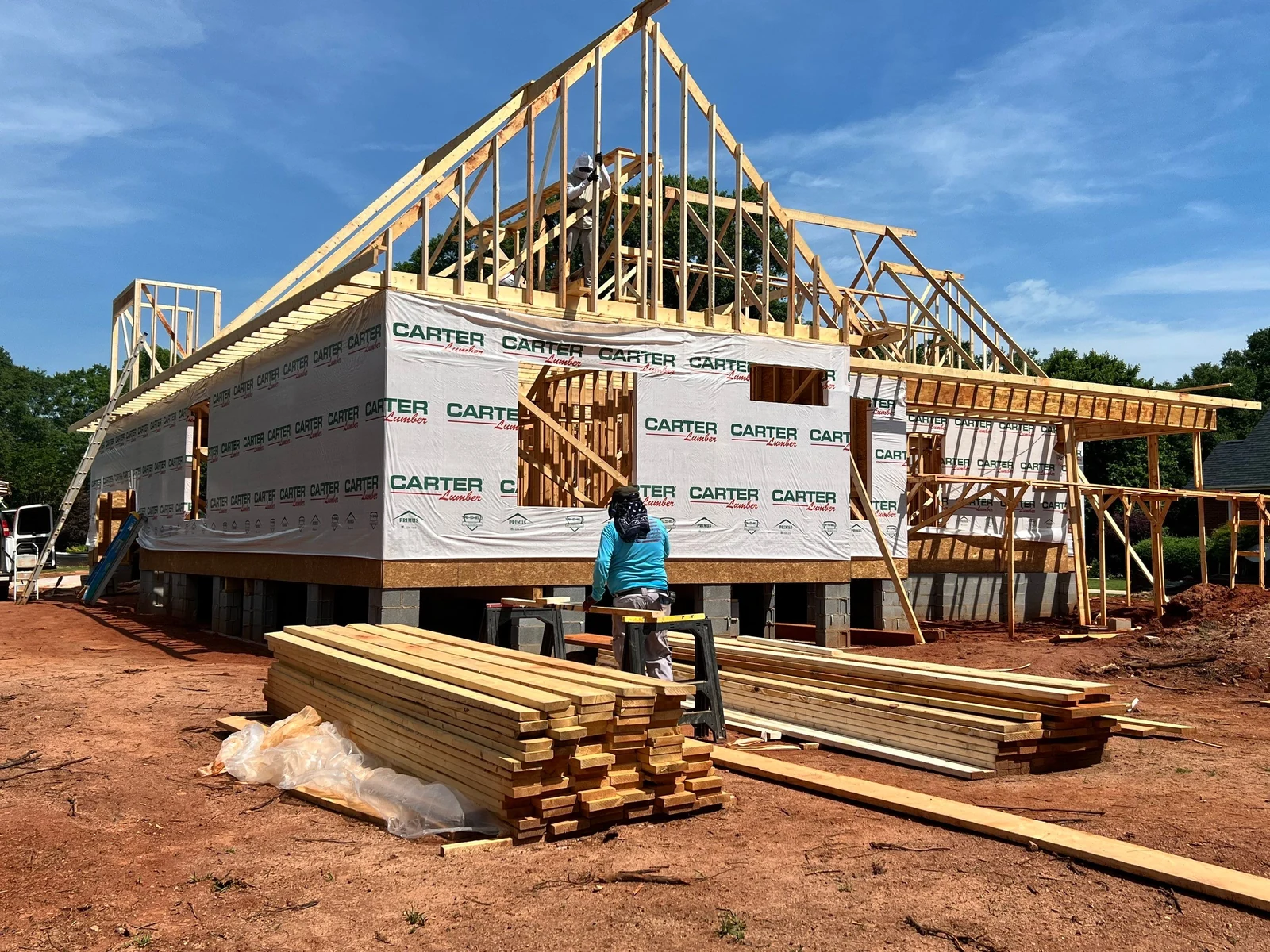 Custom home frame with roof trusses set